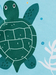 Toddler tee and shorts set with a green sea turtle print on light blue fabric.