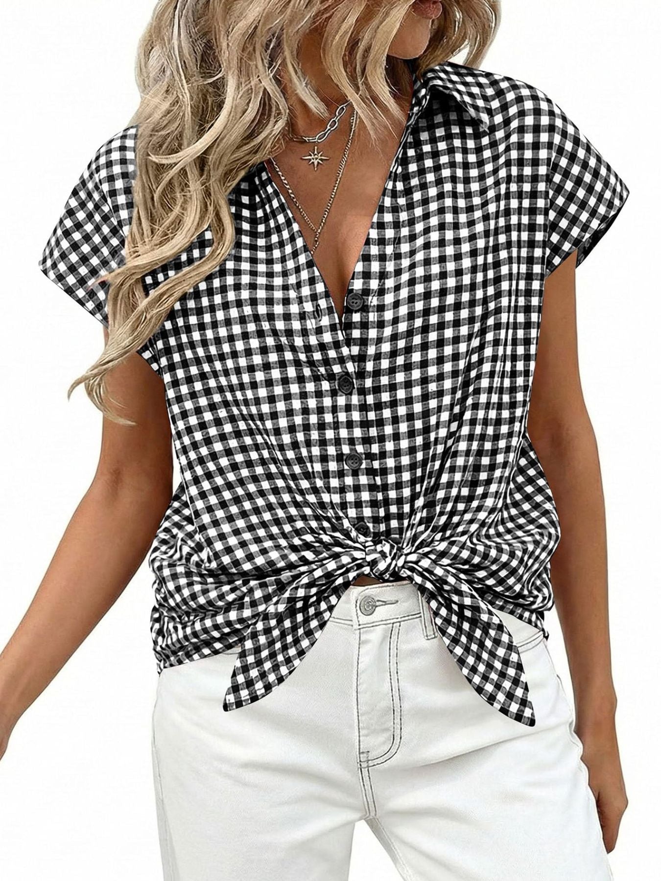 Black gingham print tied button-down shirt with short sleeves and a deep V-neck.