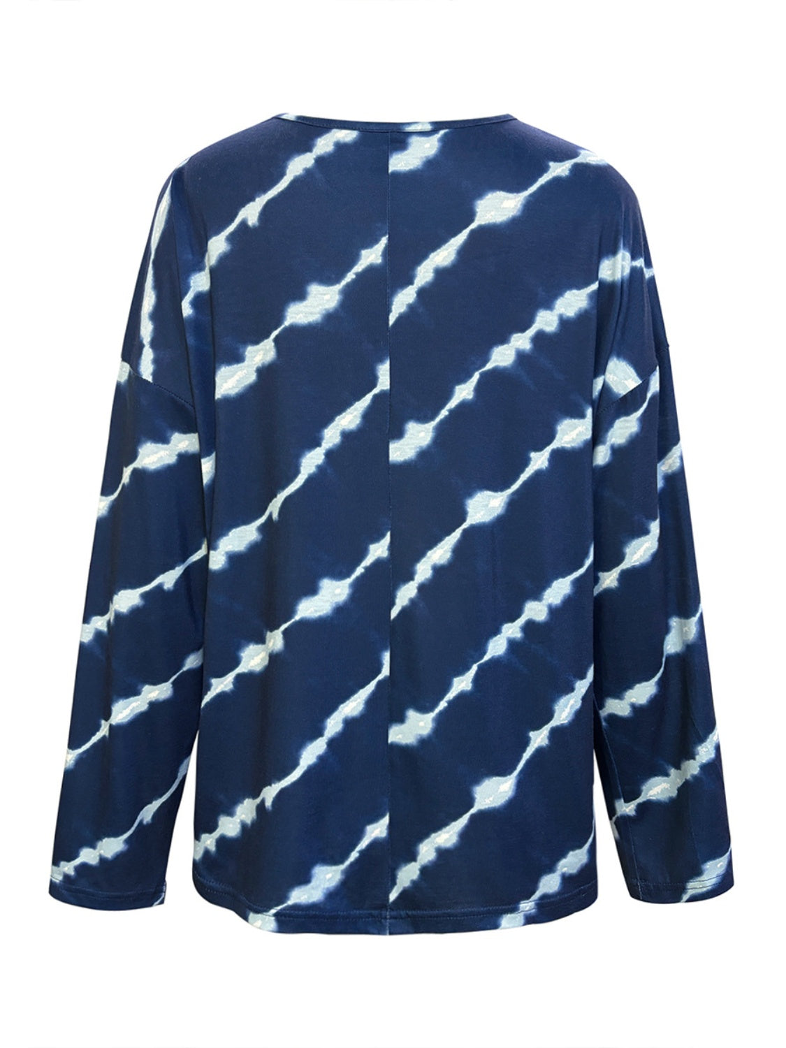 Indigo tie-dye long sleeve Henley top in peacock blue with diagonal white streaks.