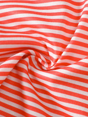 Coral and white striped baby polo shirt fabric detail