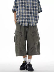 Relaxed cargo capris in grey with multiple pockets and a loose fit.