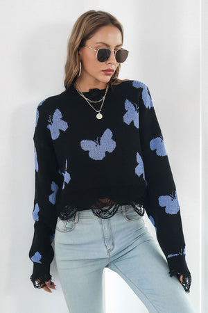 Black acrylic butterfly intarsia cropped knit sweater with frayed hem and cuffs.