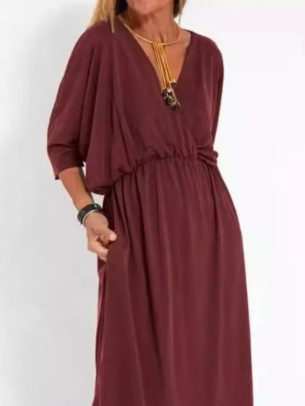 Wine red V-neck maxi dress with dolman sleeves, elastic waist, and side slits.