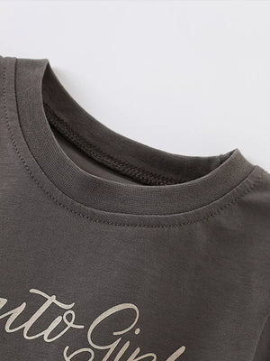 Toddler crew neck t-shirt in charcoal gray cotton with a playful script graphic.
