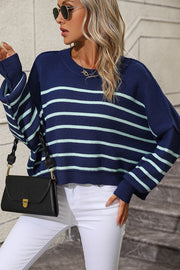 Nautical stripe boxy knit sweater in dark blue with aqua stripes, crew neck, and relaxed fit.