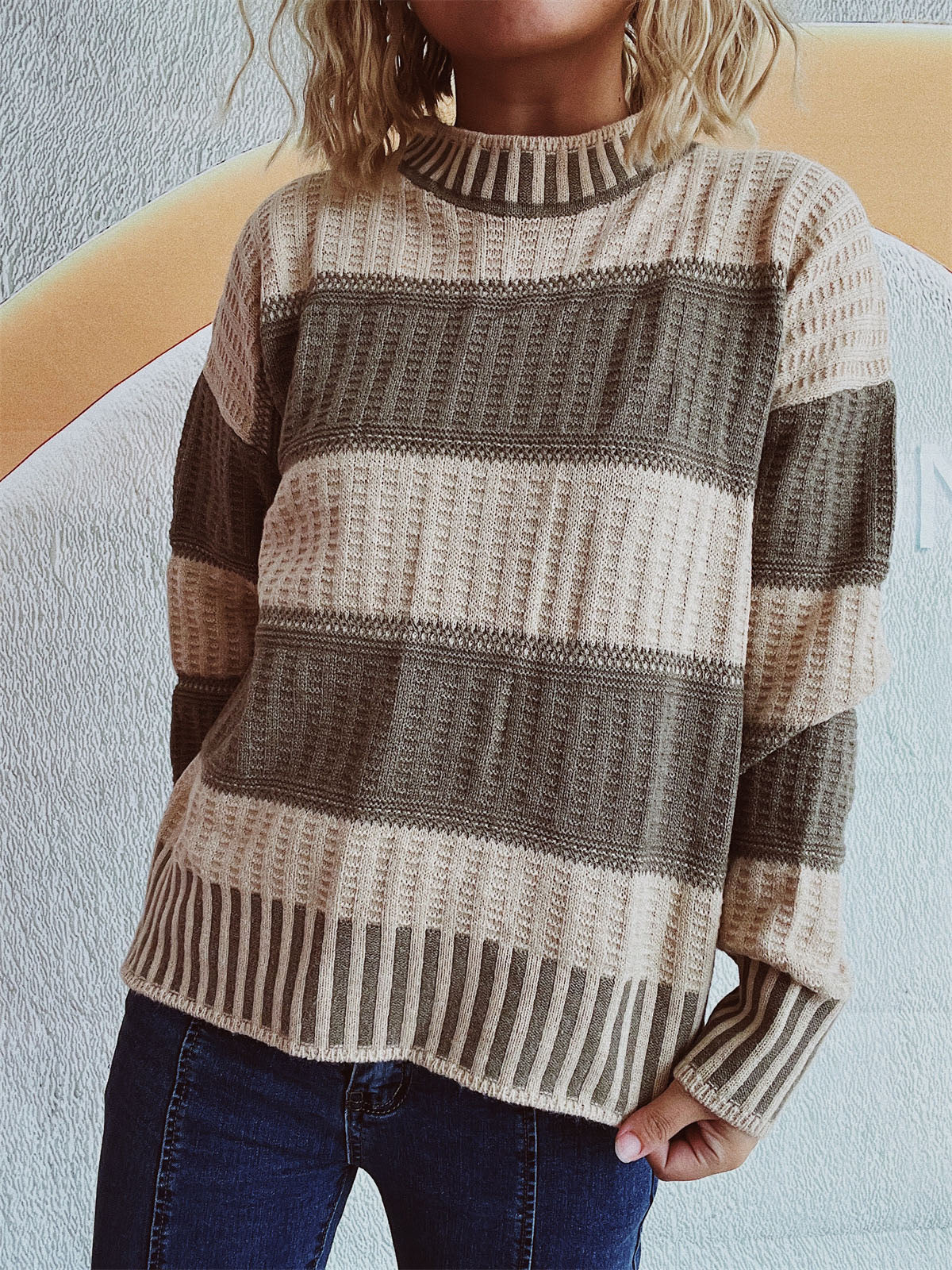 Textured stripe mock neck knit sweater in beige and olive with a waffle knit texture.