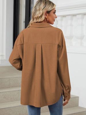 Caramel corduroy overshirt with buttoned cuffs and back pleats.
