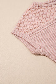 Dusty pink waffle knit top with intricate lace yoke detail and textured sleeves.