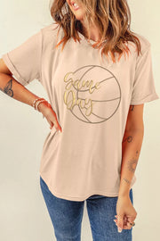 Beige cotton graphic t-shirt with basketball design and gold text.