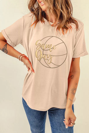 Beige cotton graphic t-shirt with basketball design and gold text.