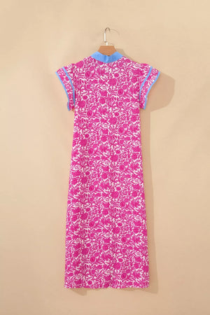 Vibrant floral midi dress with ruffle sleeves and blue collar.
