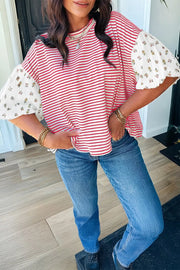 Red and white striped maternity shirt with floral puff sleeves and crew neck.