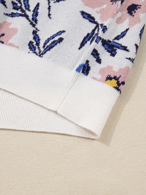 Patchwork sweater with floral design in floral color, featuring ribbed cuffs and hem.