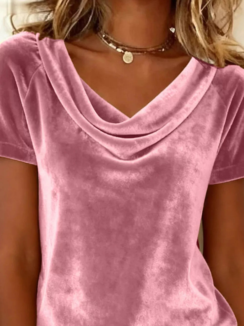 Dusty pink velvet t-shirt with a draped cowl neck and short sleeves.