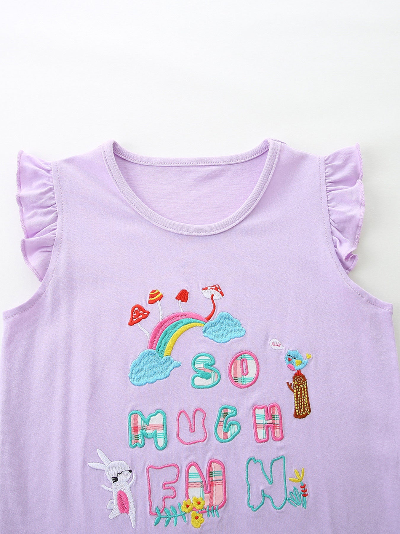 Girls' cotton tee with ruffle sleeves and rainbow mushroom embroidery.
