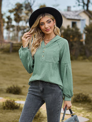 Textured knit henley hoodie in Gum Leaf with balloon sleeves and button detail