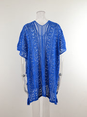 Royal blue open-knit V-neck beach cover-up with short sleeves and tassel trim.