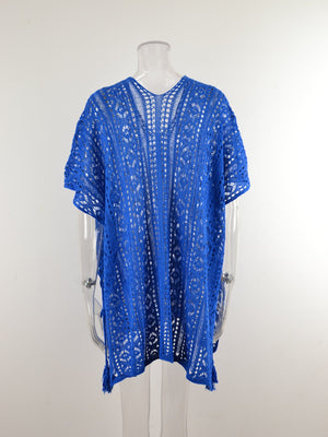Royal blue open-knit V-neck beach cover-up with short sleeves and tassel trim.