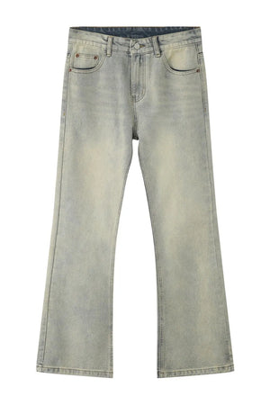 Light blue vintage wash flare denim trousers with a faded look.