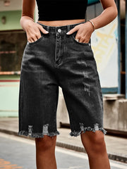 Black distressed knee-length denim cutoff shorts with frayed hem