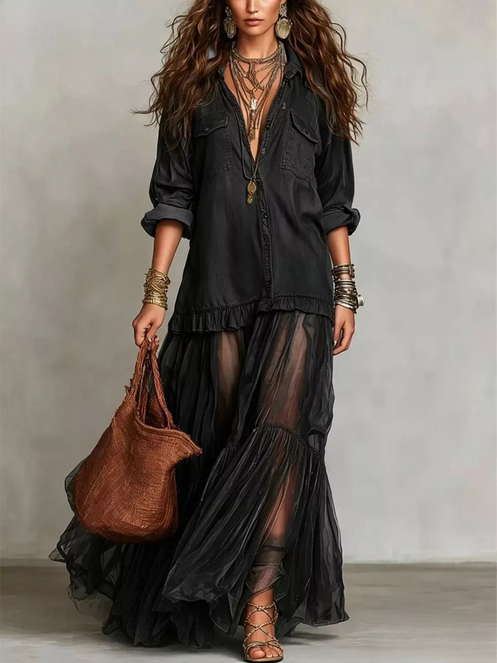 Black sheer ruffle maxi dress with buttoned detailing and long sleeves.