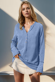 Light Blue waffle knit henley shirt with button placket and long sleeves.
