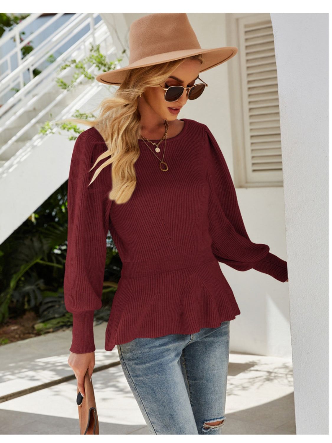 Burgundy ribbed knit peplum top with puff sleeves and crew neck