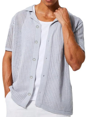 Gray open-knit resort shirt with short sleeves, button front, and collar, worn over a white tee.