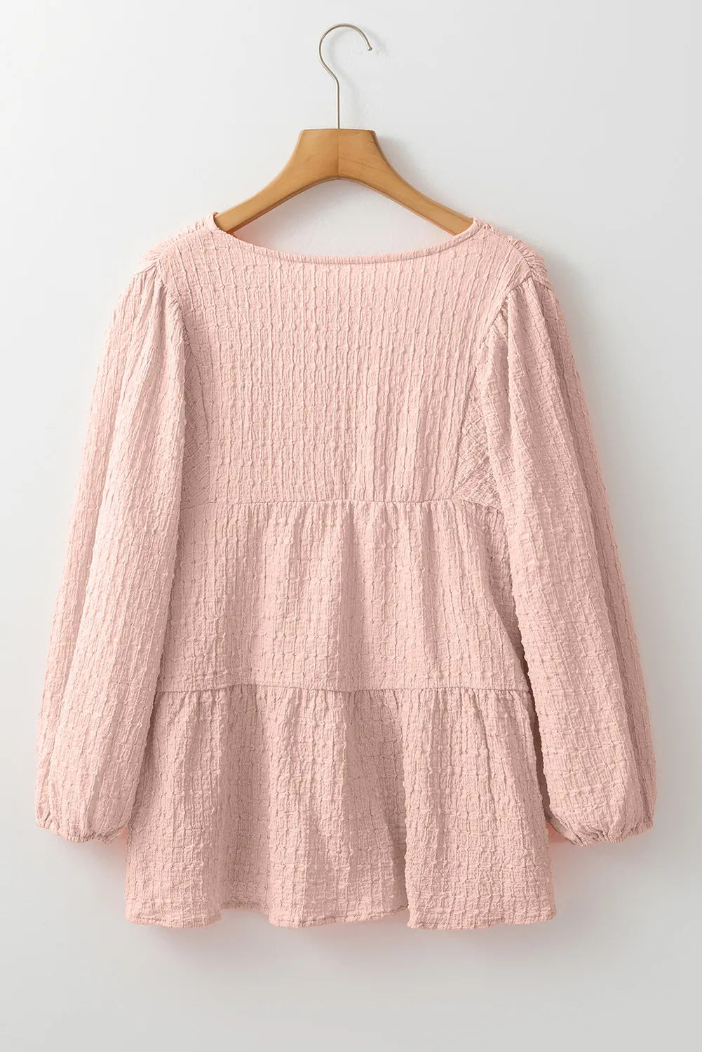 Watermelon pink textured tiered blouse with long sleeves and tie detail