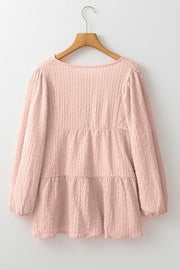 Watermelon pink textured tiered blouse with long sleeves and tie detail