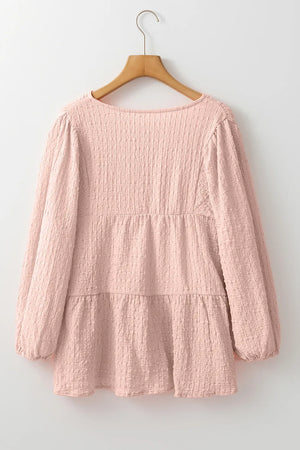 Watermelon pink textured tiered blouse with long sleeves and tie detail