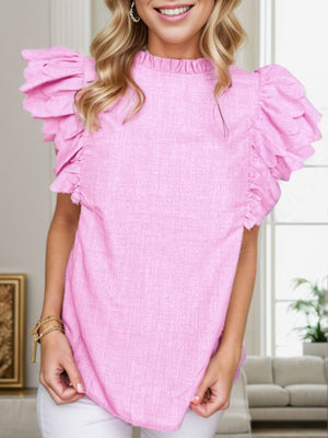 Pink ruffle sleeve blouse with mock neck and textured fabric