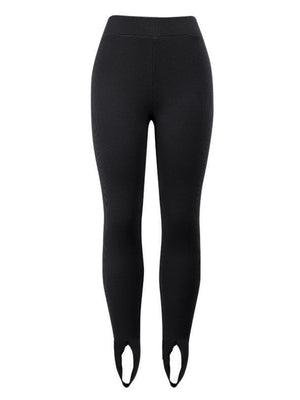 Black ribbed knit stirrup leggings with a high waist.