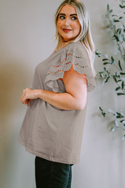 Eyelet flutter sleeve tee in mocha with scalloped eyelet detail on sleeves.
