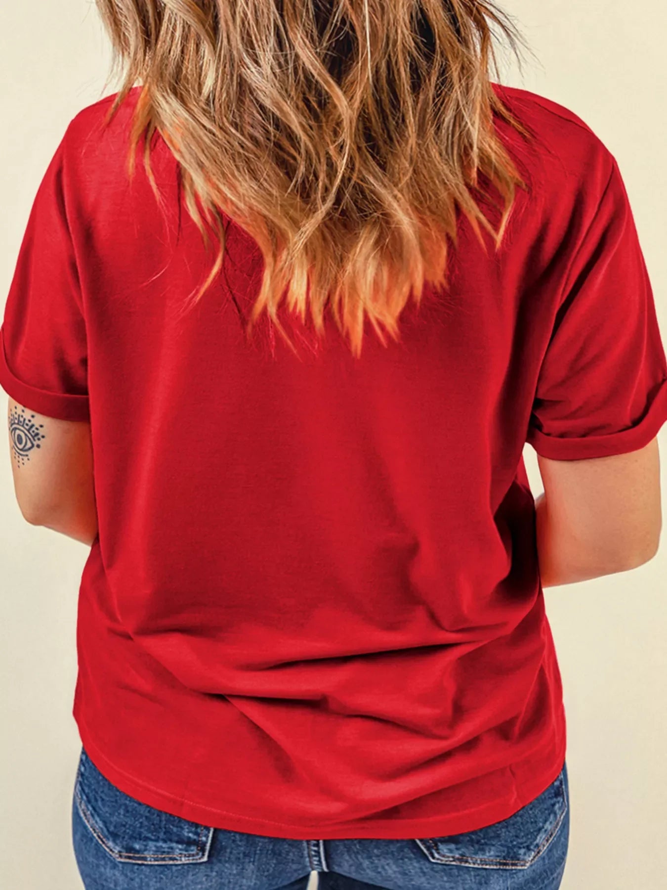 Scarlet red basic tee with cuffed short sleeves and a relaxed fit.