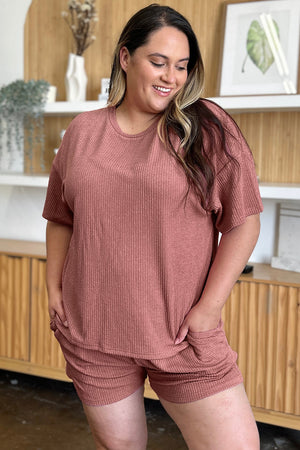 Light Mauve ribbed knit outfit set with crew neck top and drawstring shorts.