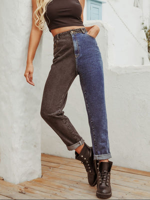 Split-tone straight leg jeans in medium wash denim with a contrasting dark wash panel.