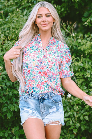 Floral ruffle collar puff sleeve blouse with a colorful floral print.