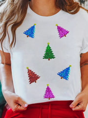White t-shirt with scattered sequin Christmas trees in blue, green, red, and purple.