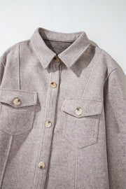 Fleece utility shirt jacket in Dust Storm with buttoned chest pockets and collar.