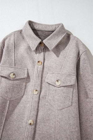 Fleece utility shirt jacket in Dust Storm with buttoned chest pockets and collar.