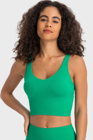 Green sculpted scoop neck crop top with a seamless fit.