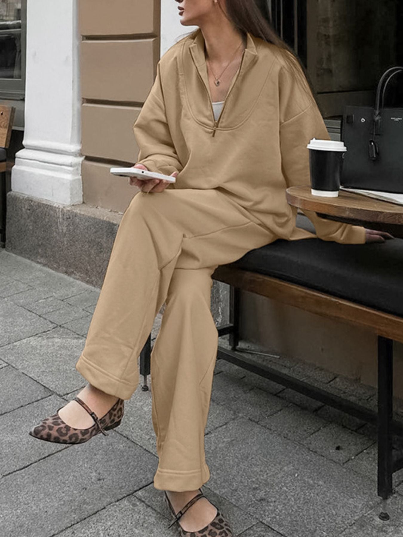 Camel quarter zip top and pants set with a relaxed fit, styled with leopard print flats.