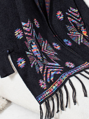 Black knit cardigan with colorful Aztec print and fringe detail