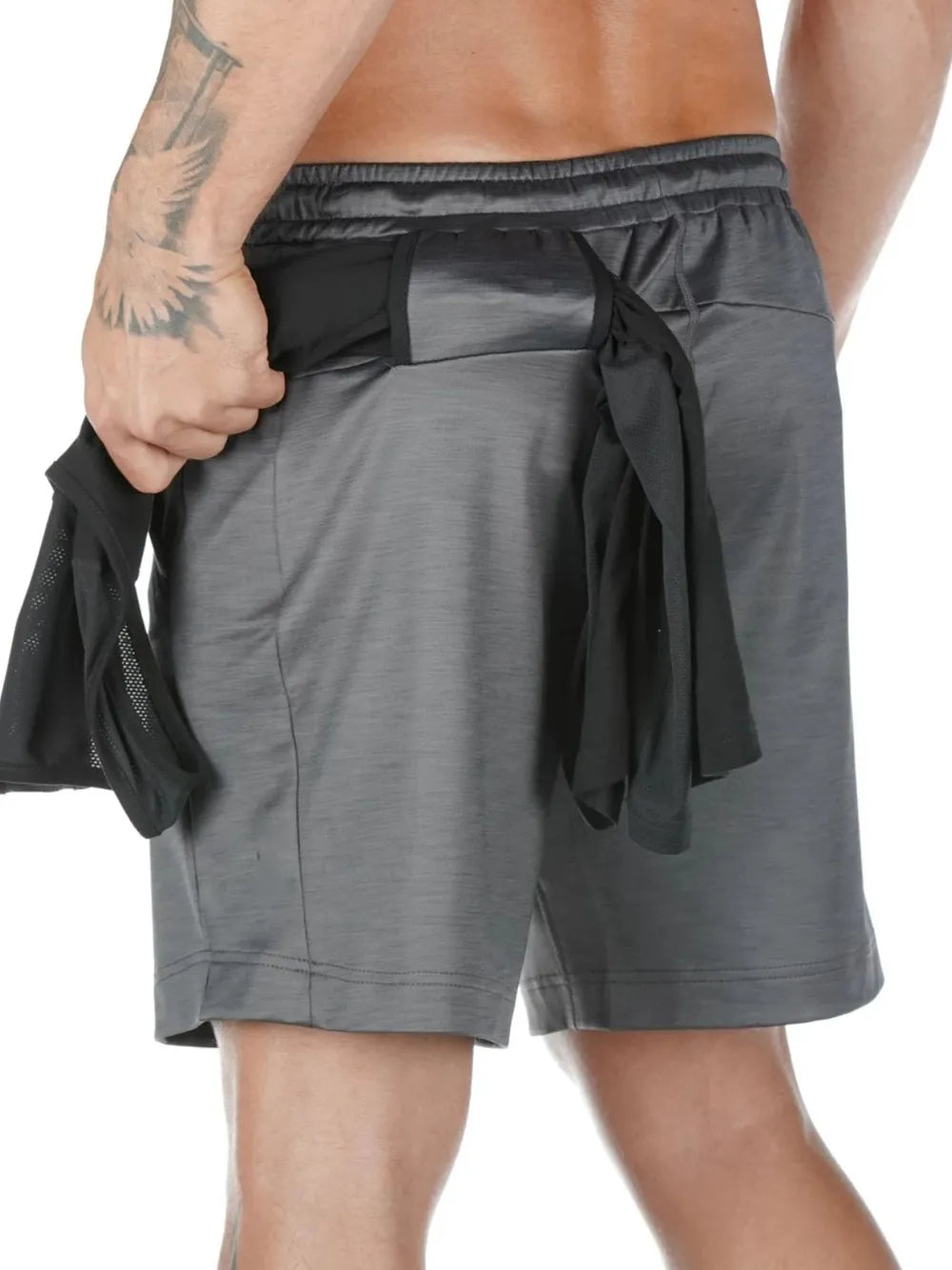 Dark gray Tech-Knit cargo shorts with black utility pocket detail and mesh accents.