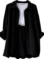 Black textured gauze shirt and shorts set with drawstring waist and white ribbed tank top.