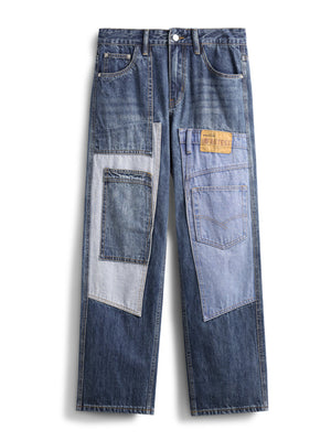Relaxed fit jeans with distinctive blue denim patchwork and distressed details.