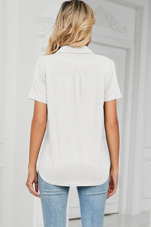 Light gray V-neck polo tee with short sleeves and a subtle back pleat detail.