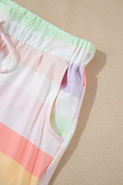 Loungewear pants with pastel rainbow stripes and a drawstring waist with pockets.