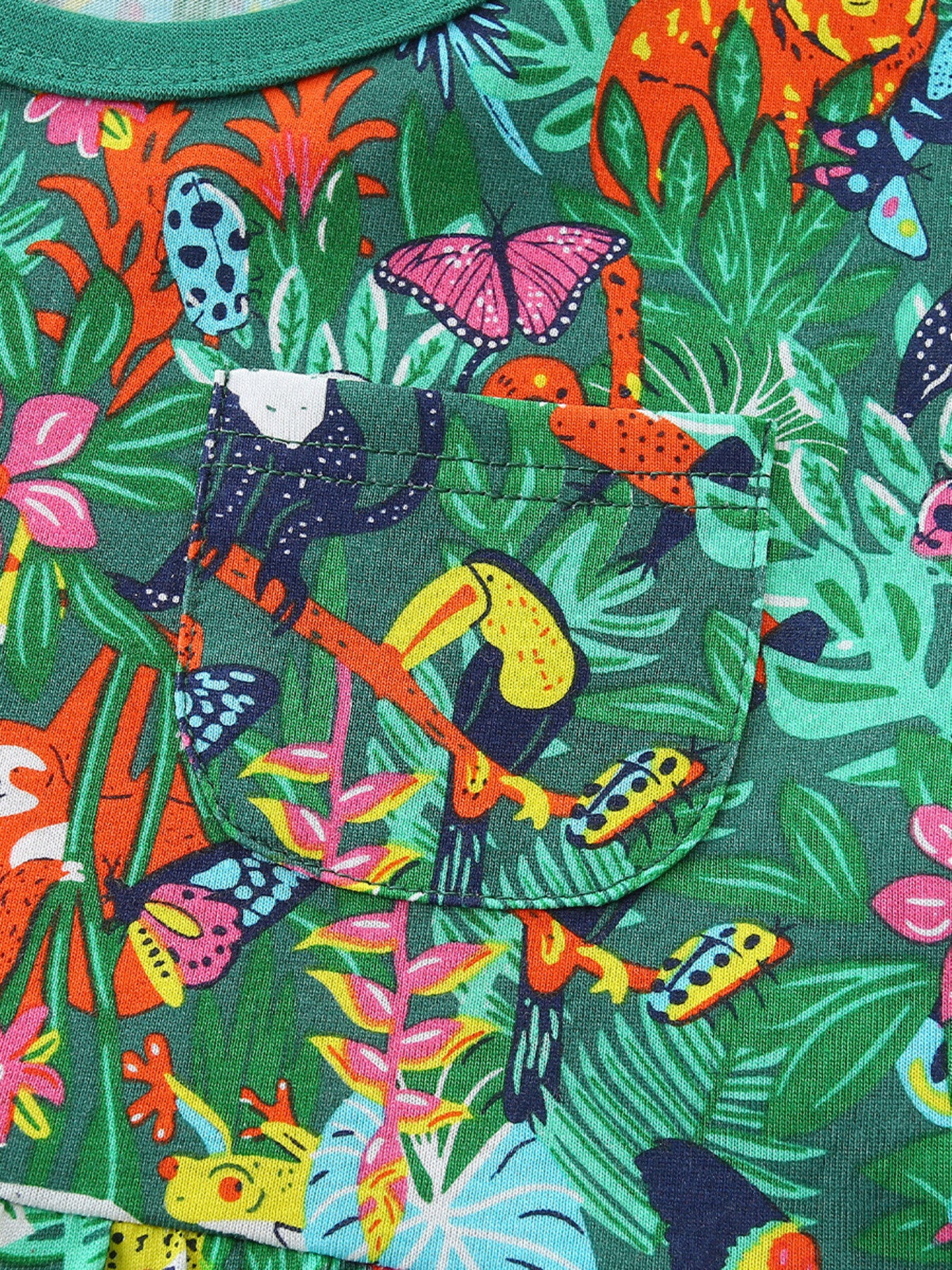Toddler cotton dress with jungle print, toucans, butterflies, and a chest pocket.